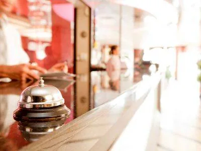Service bell on a hotel front desk counter